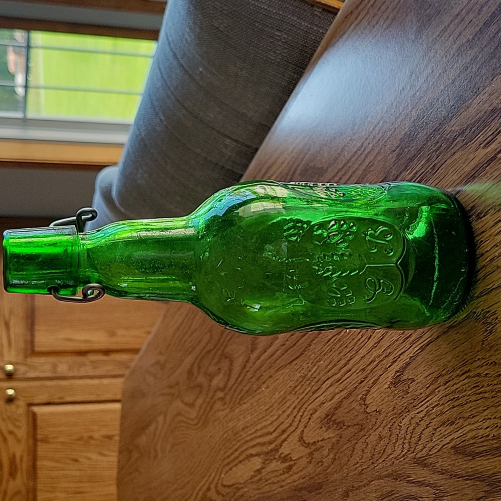 Green bottle decorative embossed